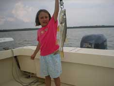 Even the little people get into the action with a Snook caught while jigging in a estuary of Marco Island.