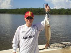 Eric from the U.K.  landed this Red fish while on his family fishing trip