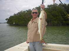 Nice Red Fish caught while on a back water fishing trip with Fins-N-Grins Charter Fishing Marco Island