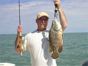 Triple Tail fish caught by angler on Marco Island aboard Fins n Grins charter fishing boat